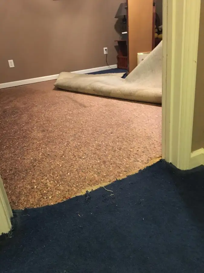 Carpet pad removal revealing water damage during Drying & Dehumidification in Temecula